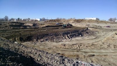 view of mine in colorado with dirt hills and equipment