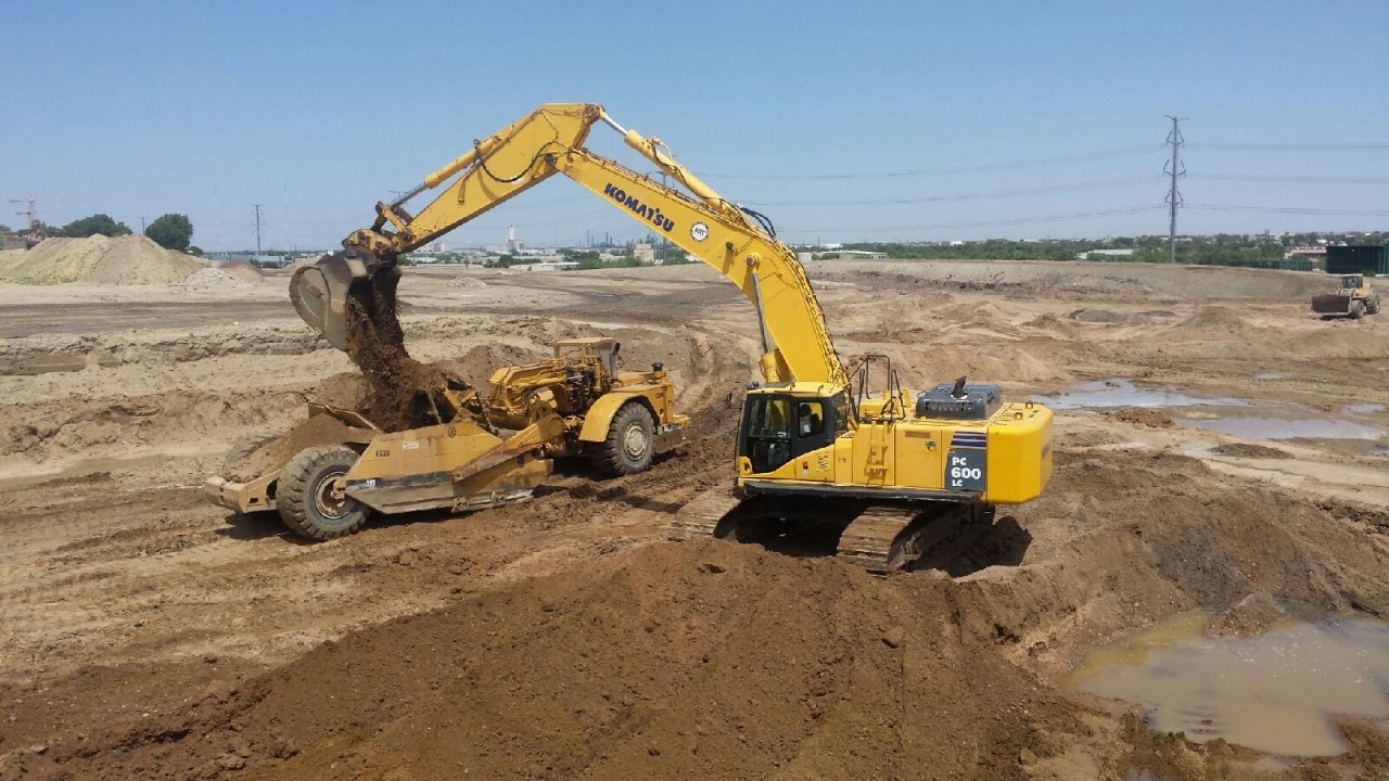 excavator in dirt mine area