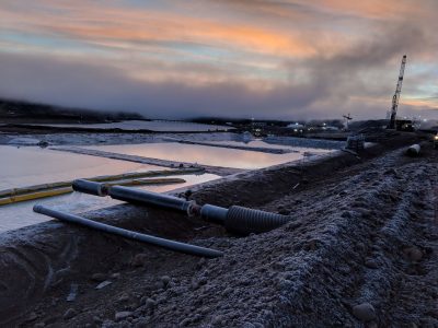 water areas with pipes and equipment at sunrise