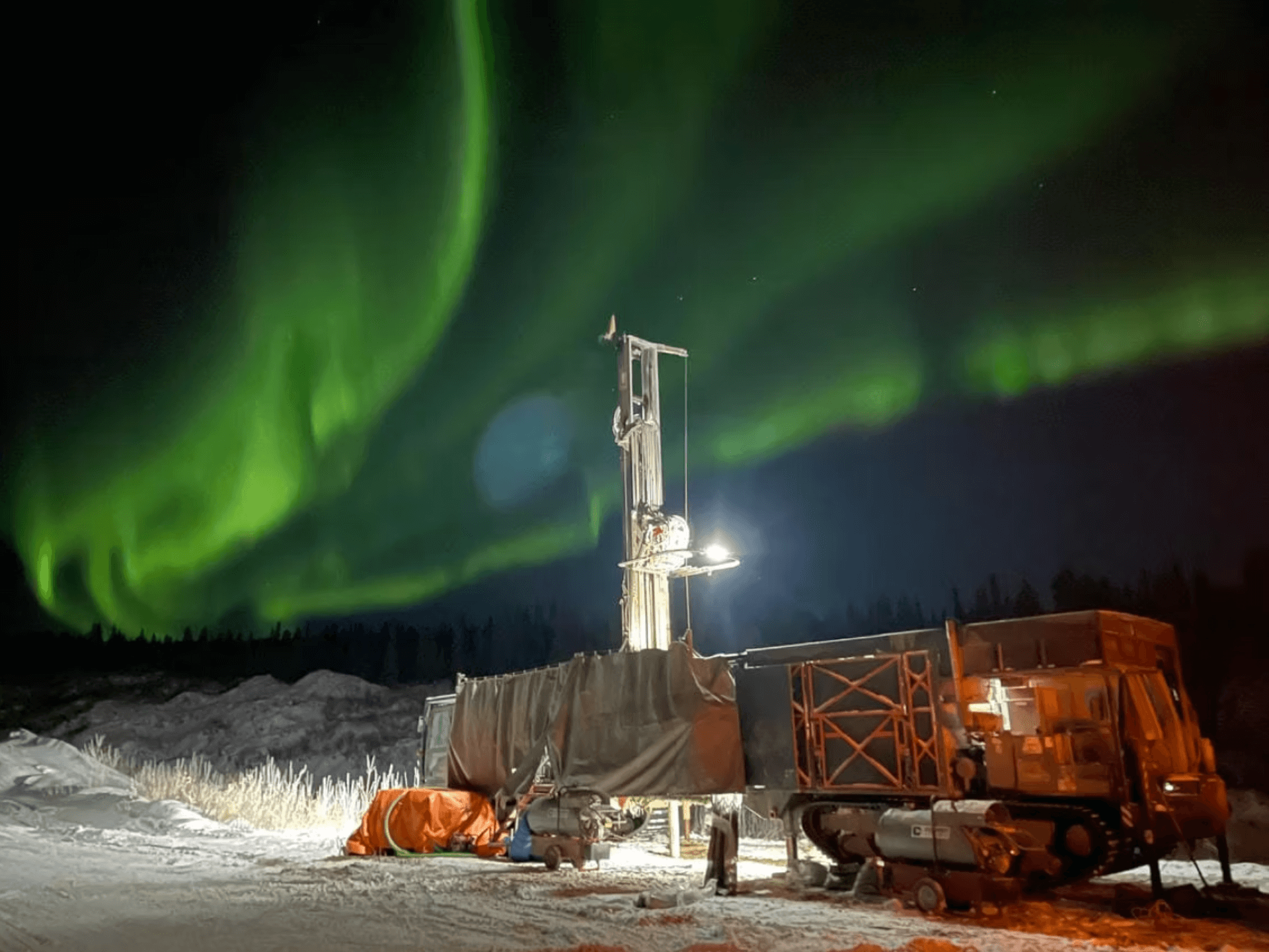 the aurora at night at the project site with equipment
