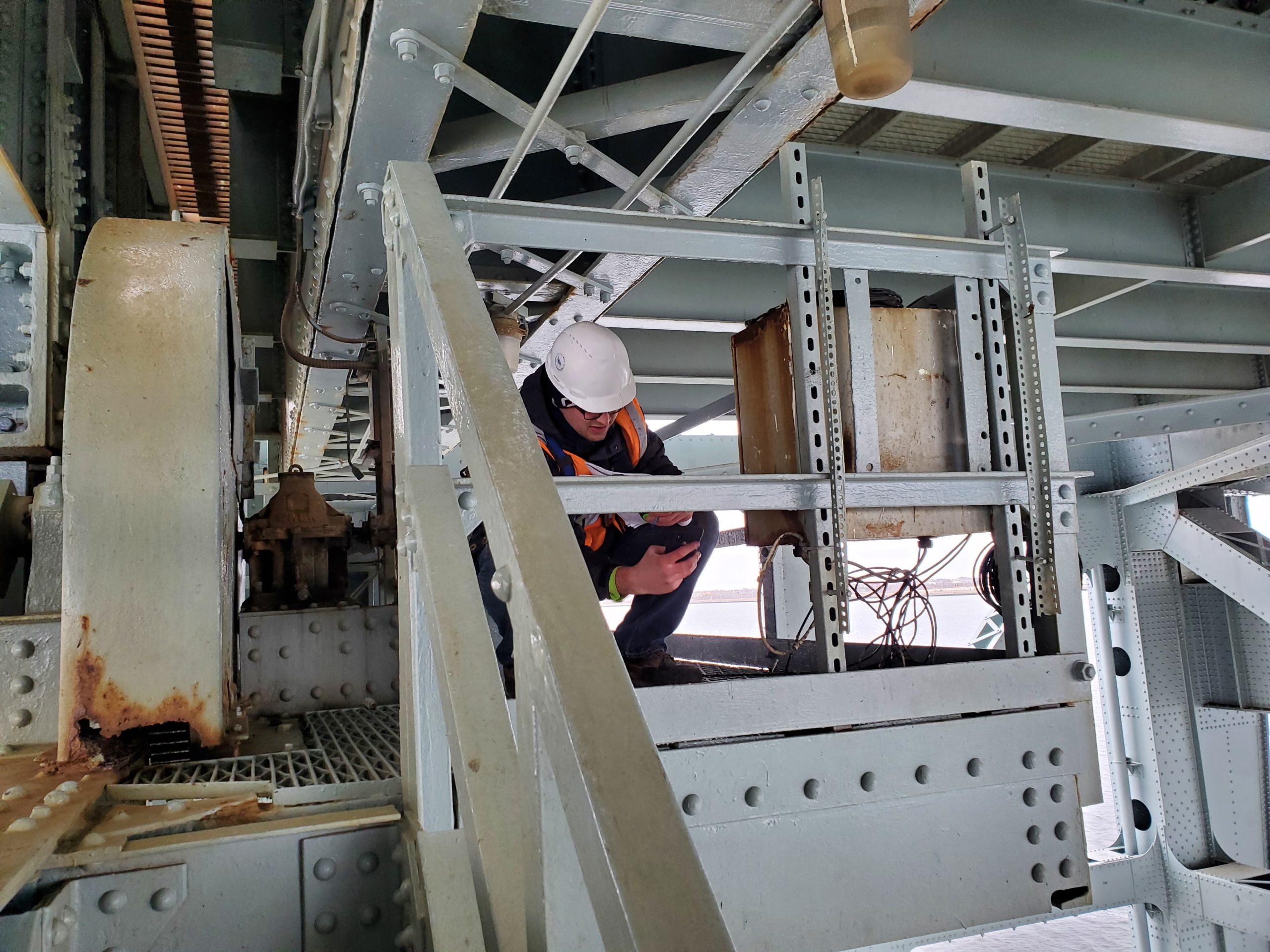 man inside bridge structure