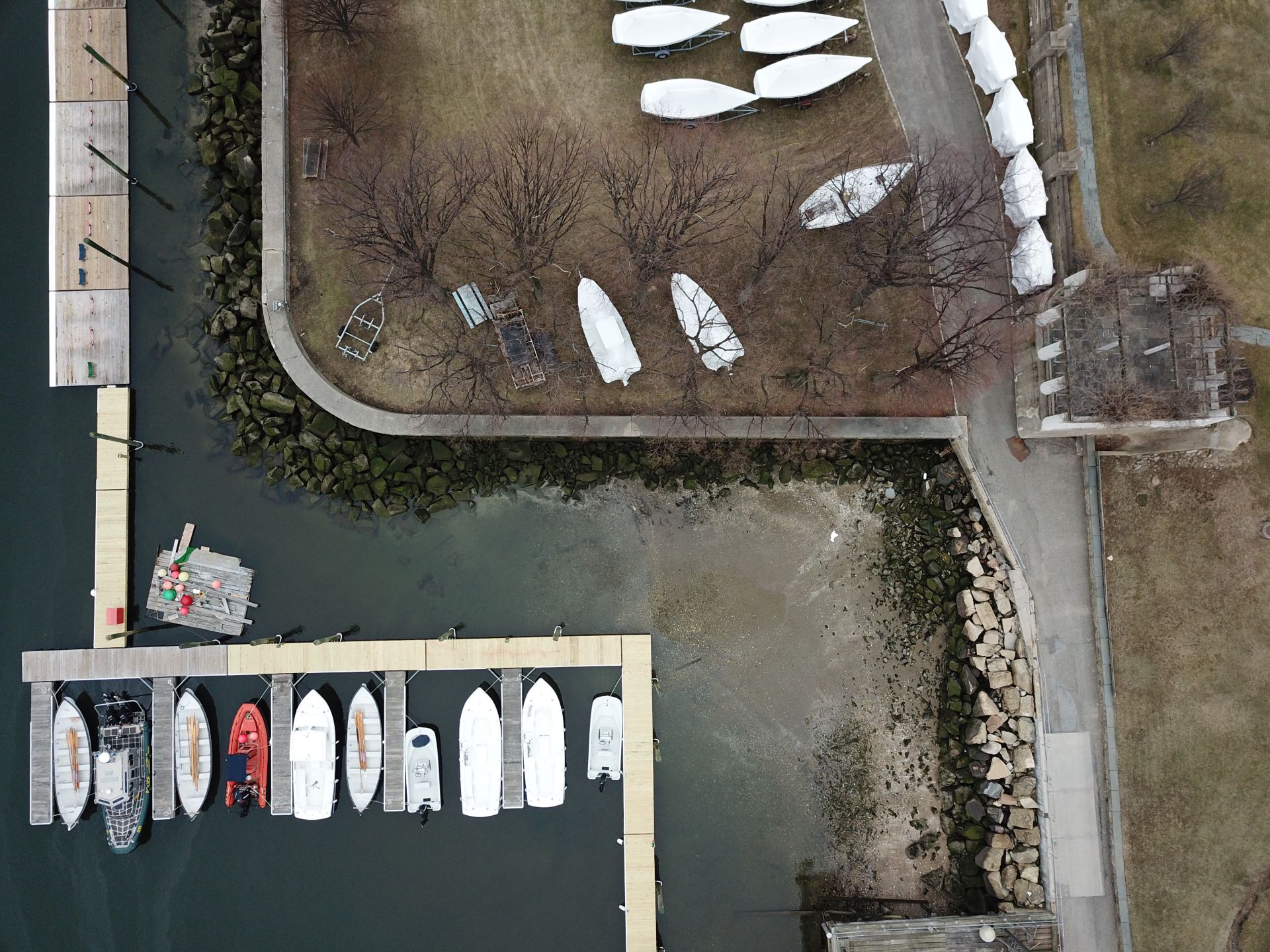 aerial shot of boats at usmma marine academy with boats