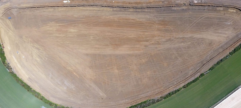 aerial view of dirt runoff area before aquatic design,