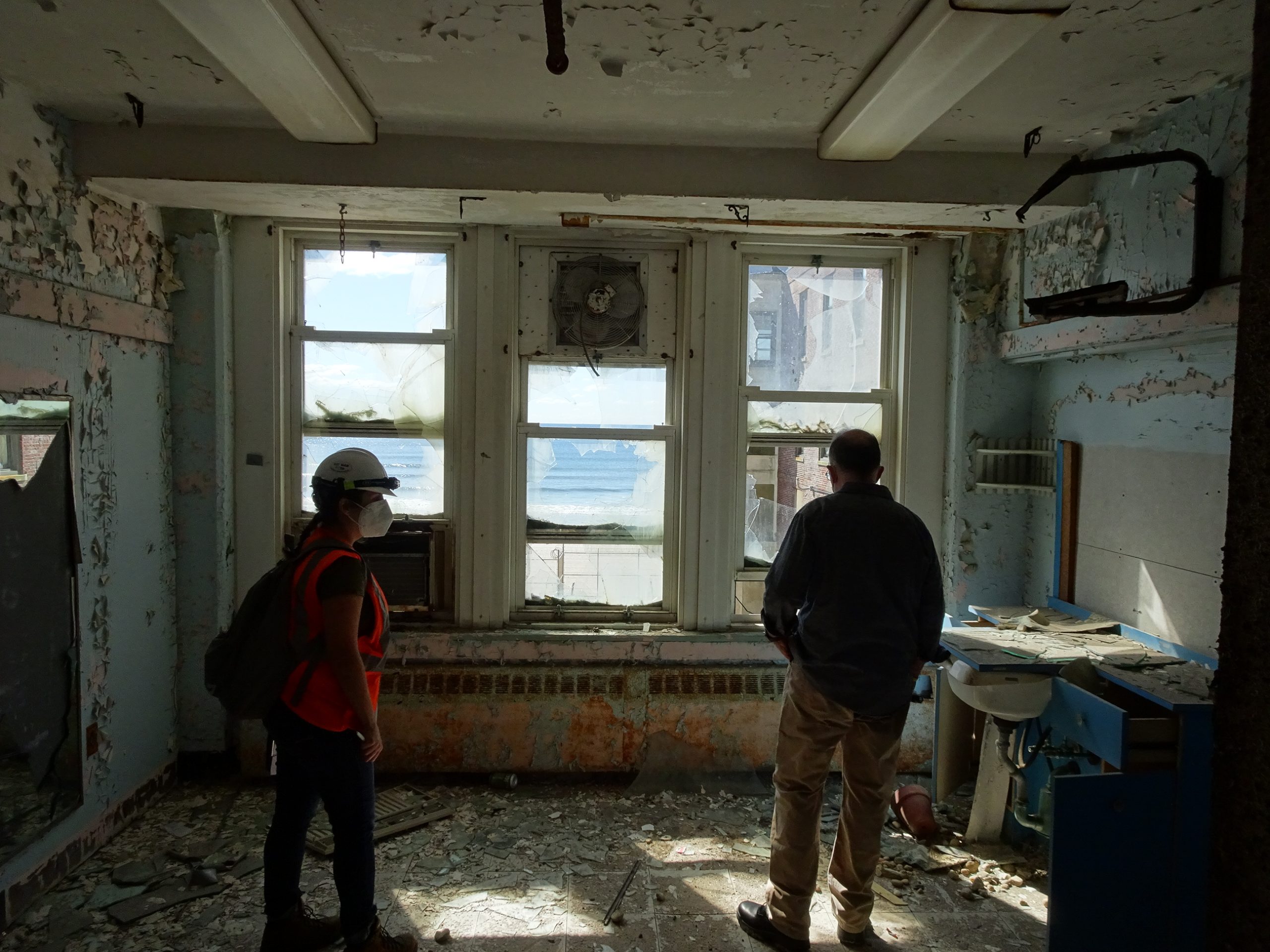 two people inside old building