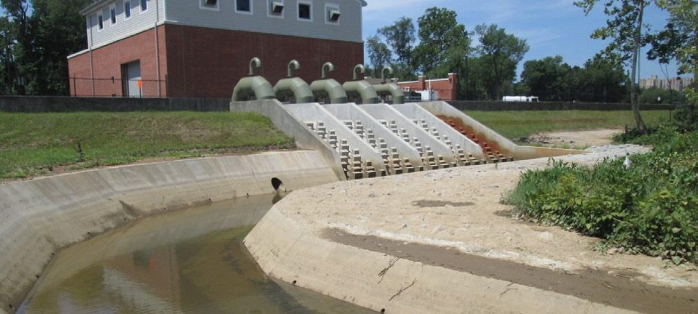 levee in huntington with house and waterway