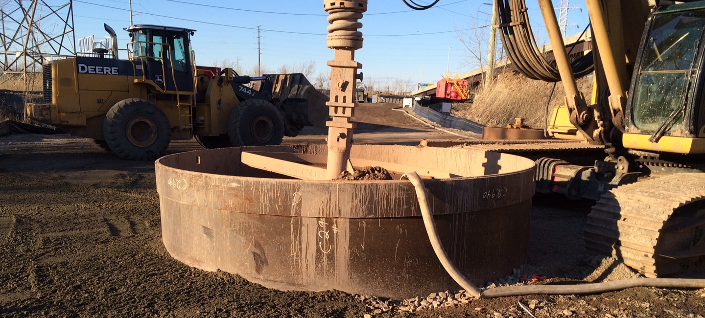 close up of drill pipe in dirt