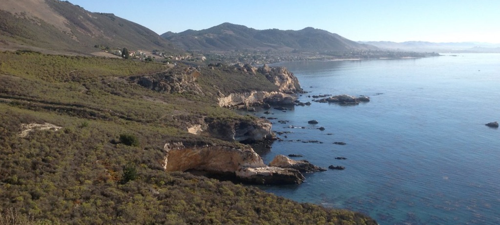 view of california coast with land on left and ocean on right