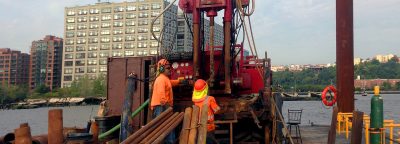 field workers on a barge