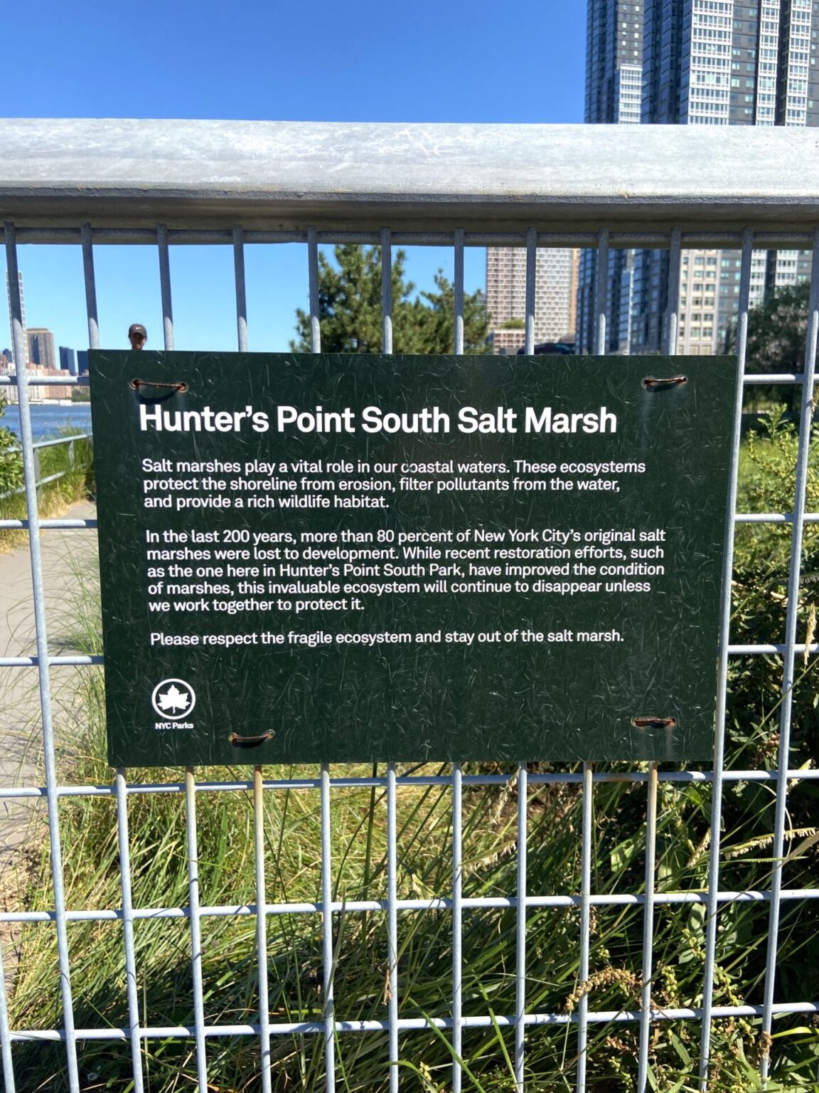 hunters point park sign on fence