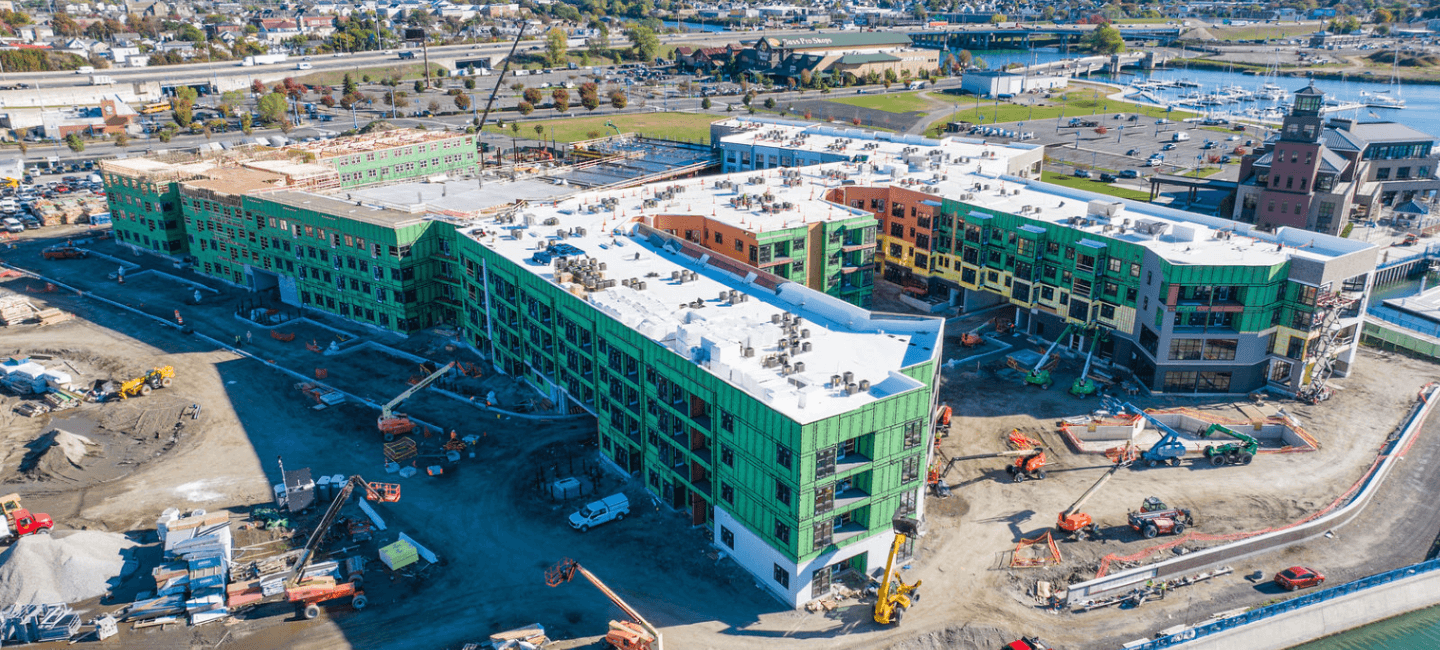 aerial view of building redevelopment at steelepoint with construction equipment
