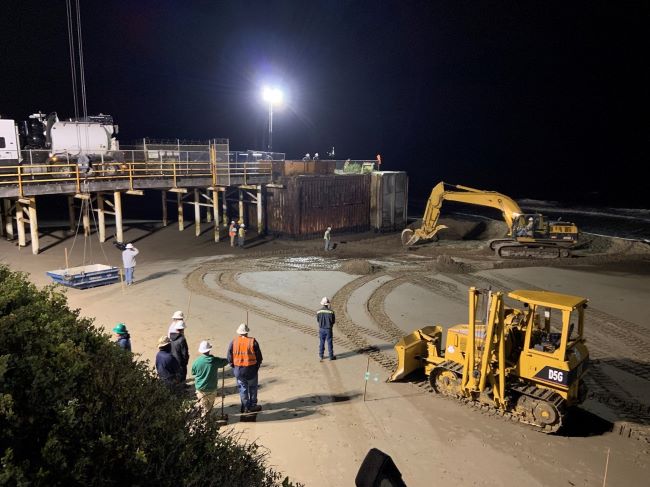 Piers-421 construction at night