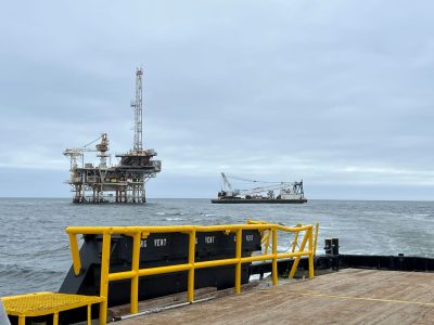 offshore platforms in ocean with deck in foreground